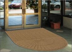 Waterhog Eco Grand Elite Floor Mat - Half Oval used as an outdoor door mat to a business