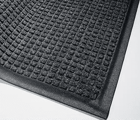 Corner detail of Waterhog Classic entry matting in a Charcoal color and standard rubber edge