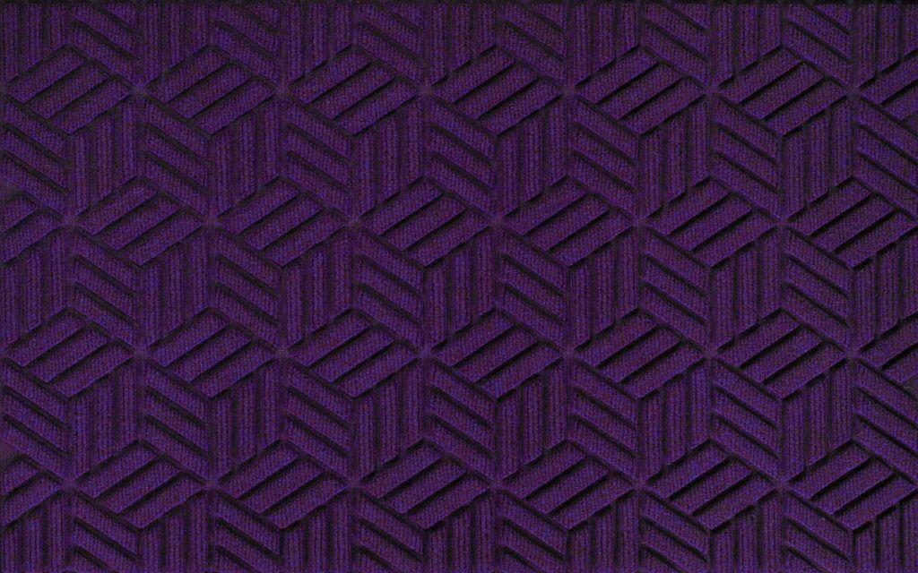 Close up view of a Purple Waterhog Legacy Classic entrance matting detailing the high tech geo floor surface pattern of the front door mat