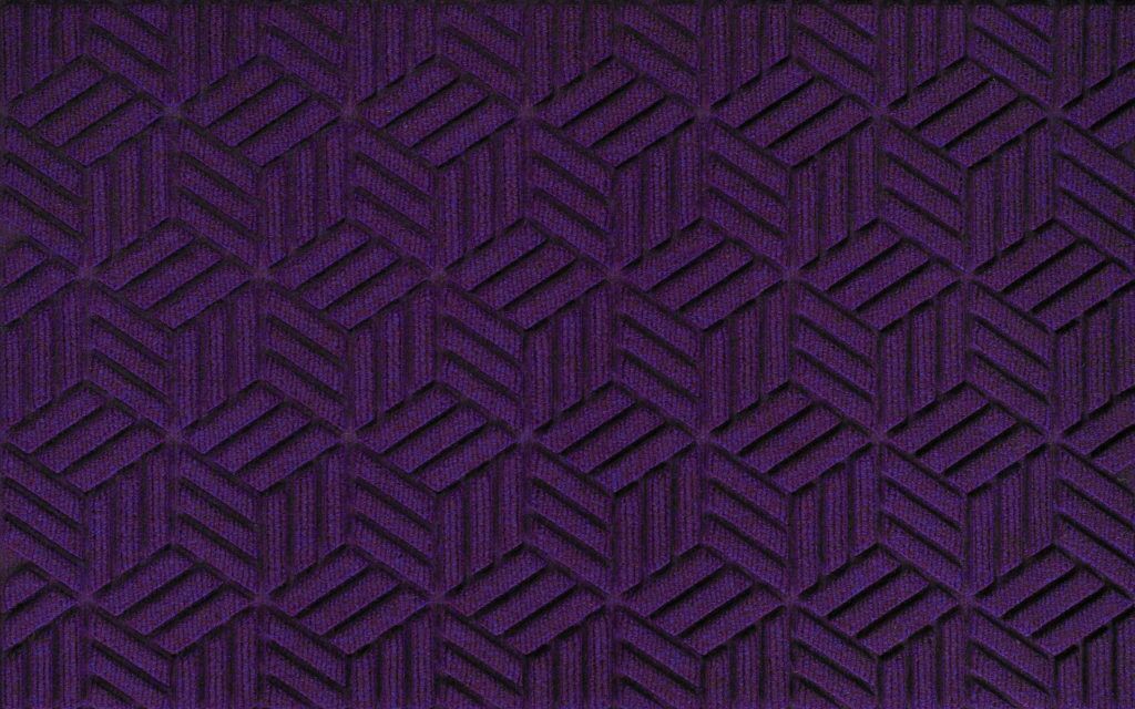 Close up view of a Purple Waterhog Legacy Classic entrance matting detailing the high tech geo floor surface pattern of the front door mat